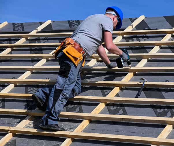 technicin installing roof